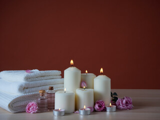 Spa composition with burning aromatic candles