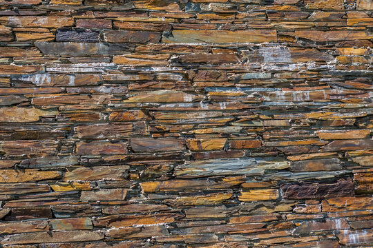 Detail view of a schist texture in detail of rustic granite wall