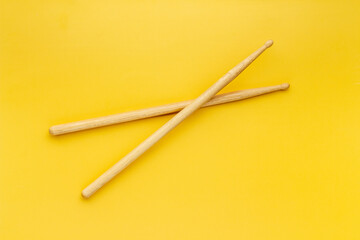 Two wooden drum sticks, top view. Music background