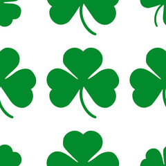 seamless texture for the background. St. Patrick's Day. green clover on a white background. decoration for the holiday