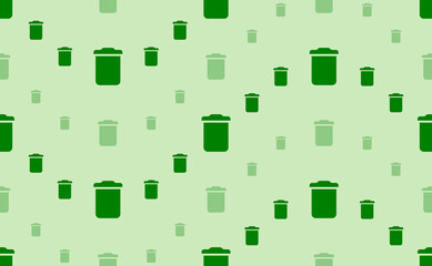 Seamless pattern of large and small green trash symbols. The elements are arranged in a wavy. Vector illustration on light green background