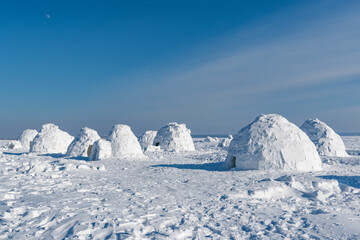 Winter dwelling of Eskimos. Igloo. Eskimos village.