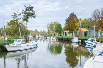 Little harbour on La Leyre river in autumn, Biganos, Arcachon Bay, Gironde, Nouvelle-Aquitaine,...