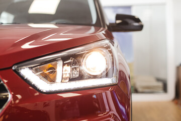 red car headlight close up, beautiful car design