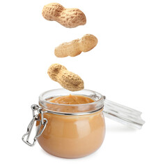 Delicious peanut butter in glass jar on white background