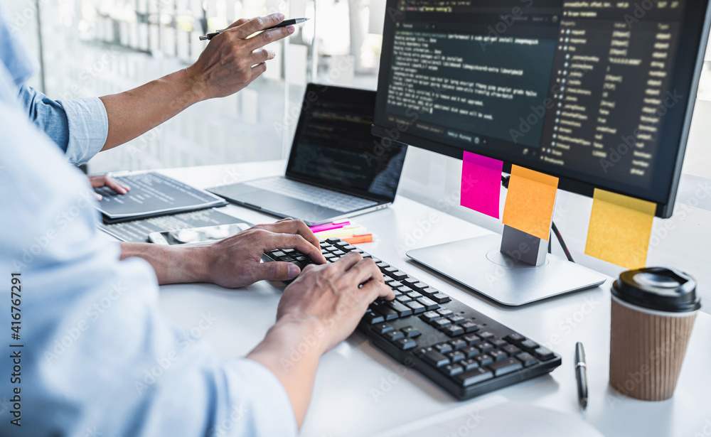 Aufkleber two professional programmer cooperating and working on web site project in a software developing on 
