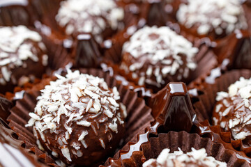close-up of chocolate candy background blurred same candy