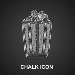 Chalk Popcorn in cardboard box icon isolated on black background. Popcorn bucket box. Vector. © Oksana
