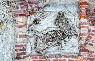 A bas-relief with grieving Demeter (Ceres) and a maid washing her feet. Pavilion 