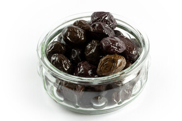 Fresh black olives in the plate
