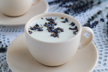 Blue lavender milk with a creamy cup