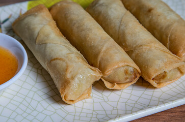 The Closure of Insulated Spring Rolls