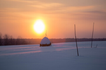 a haystack at dawn. Arkhangelsk region. Russia