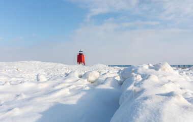 Naklejka na ściany i meble The red Charlevoix lighthouse in winter