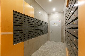 mailboxes in the lobby of an apartment building