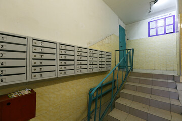 mailboxes in the lobby of an apartment building