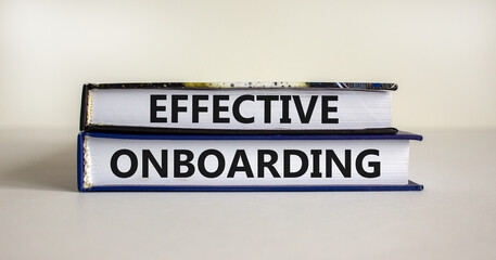 Effective onboarding symbol. Books with words 'effective onboarding' on beautiful white background. Business and effective onboarding concept. Copy space.