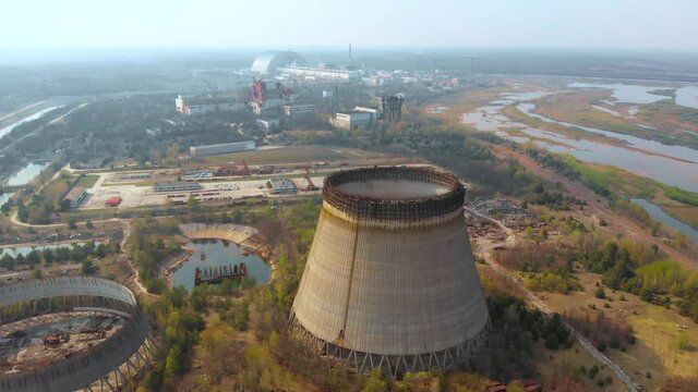 Chernobyl nuclear power plant. Landscape top view of the nuclear power plant in Chernobyl. Cooling tower overlooking the nuclear power plant in Chernobyl. View of the destroyed nuclear power plant.