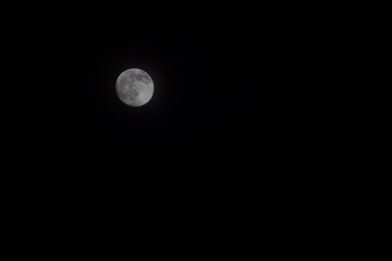 full moon in the night sky. In Brasilia, Brazil.