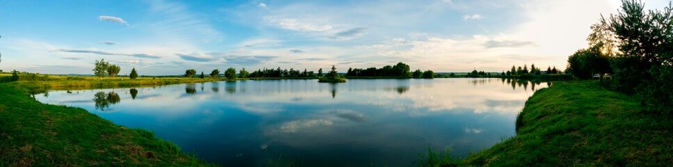 Fototapeta na wymiar Panorama lake view in sunrise time /Sunrise at the lake