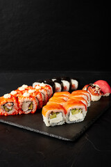 set of rolls on a black textured background