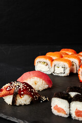 set of rolls on a black textured background