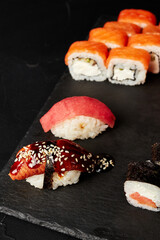 set of rolls on a black textured background