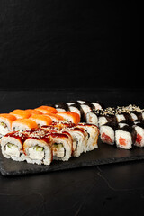 set of rolls on a black textured background