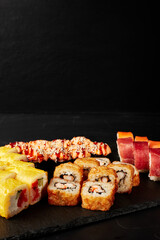 set of rolls on a black textured background