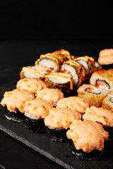 set of rolls on a black textured background