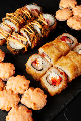set of rolls on a black textured background