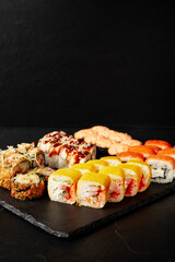 set of rolls on a black textured background