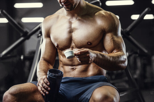Bodybuilder protein powder after fitness workout