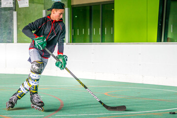 Inline skating, young man skating inline