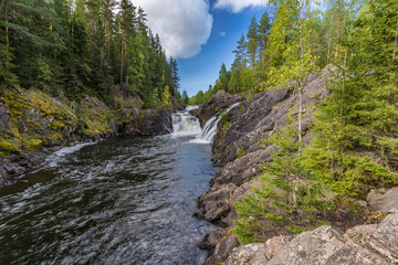 Fototapeta na wymiar Kivach waterfall in Karelia, Russia