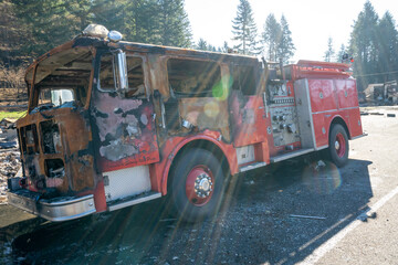 A fire engine in the city of Detroit Oregon, Willamette National Forest, was destroyed by the Beachie Creek Wildfire, lens flair ehhances the mood
