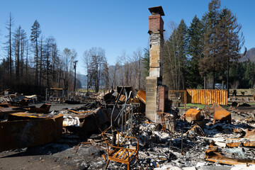 Home in Detroit Oregon totally destroyed by the Beachie Creek wildfire.  Chimney and fireplace all...
