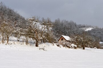 mountain house in the snow in winter