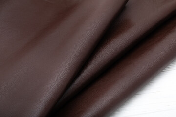 Natural folded dark brown cow leather	
