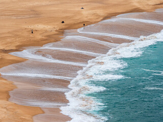 A regular pattern of back-flowing water on Nazaré beach