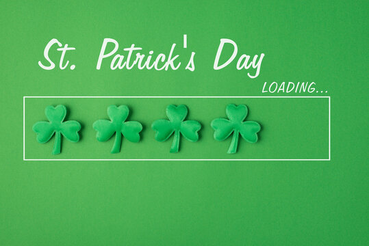 St. Patrick's day loading concept. Photo picture of clover leaves with text waiting for the date isolated bright color green backdrop
