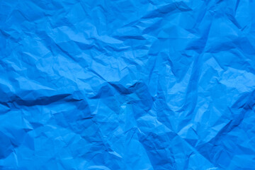 Obraz premium Background from crumpled colored paper. View from above.