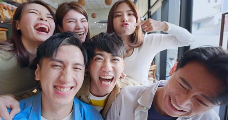 friends take selfie in restaurant