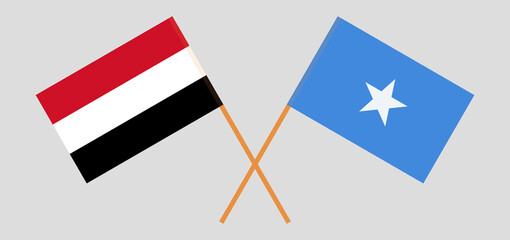 Crossed flags of Yemen and Somalia. Official colors. Correct proportion