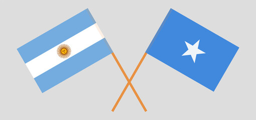 Crossed flags of Argentina and Somalia. Official colors. Correct proportion