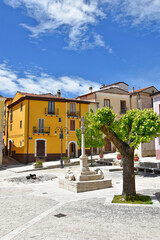 Fototapeta na wymiar A street among the colorful houses of Frosolone, an old town in the Molise region, Italy.