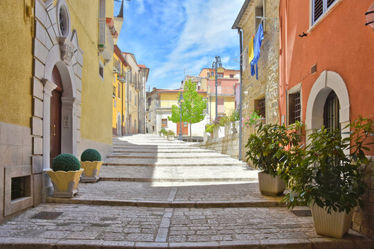 A street among the colorful houses of Frosolone, an old town in the Molise region, Italy.