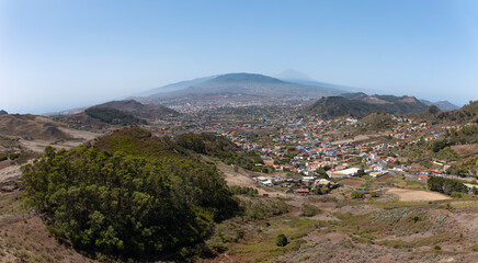 View from a lookout point in the Anaga mountains on the island of Tenerife to the west. In the distance you can see the northern airport and behind it in the haze Spain's highest mountain, the Teide.
