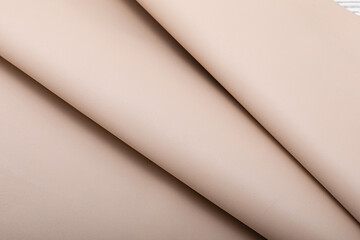 Light beige dyed cow leather.