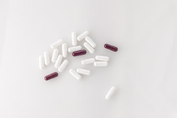 pills on white background.